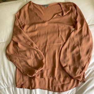 Long sleeve cream/nude color blouse. Never worn.